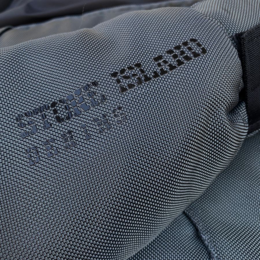 stone island denims spell out logo