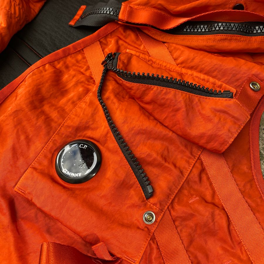 cp company lens on utility vest
