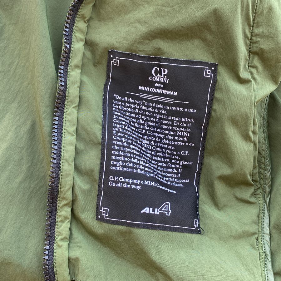 cp company wears mini countryman label