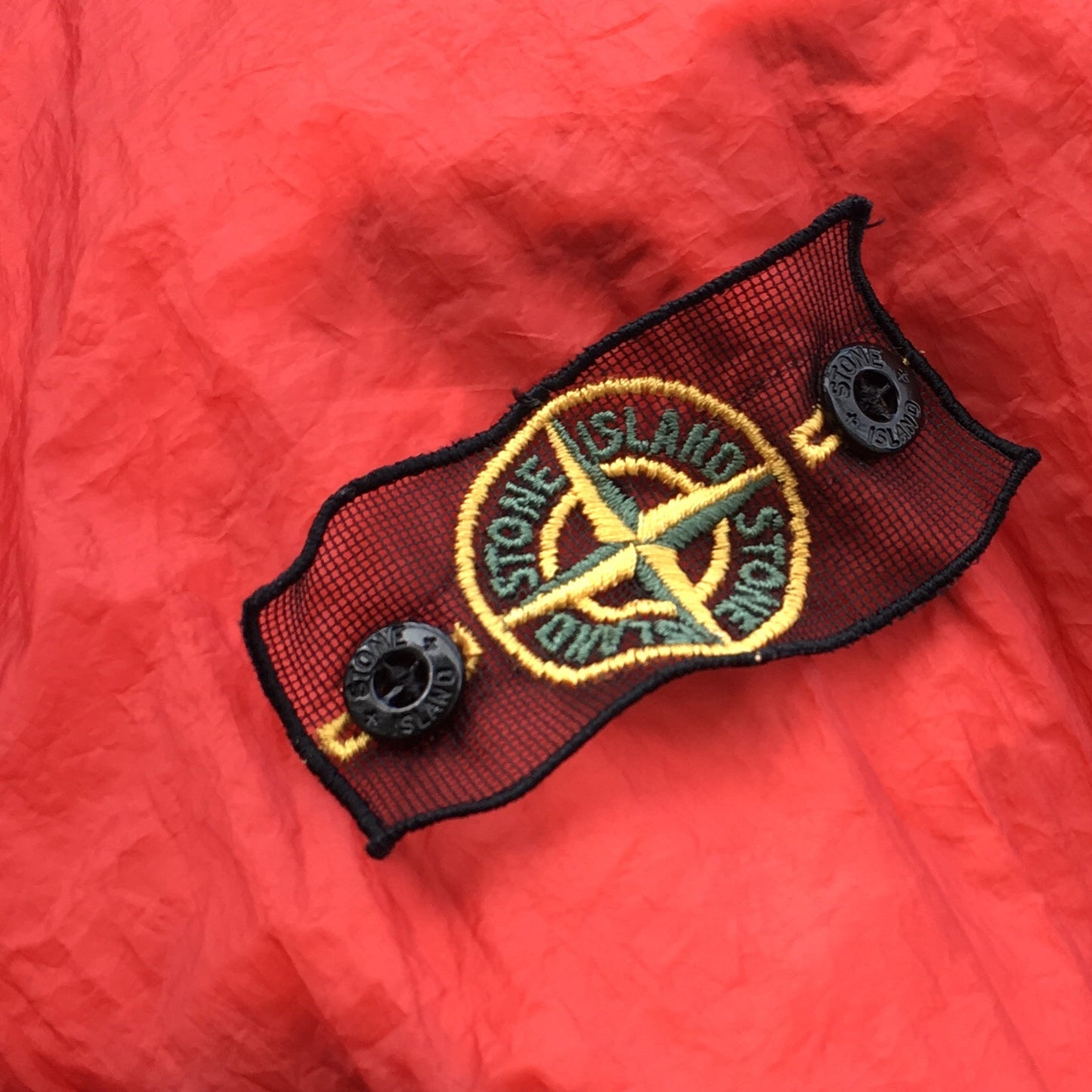 stone island mesh badge