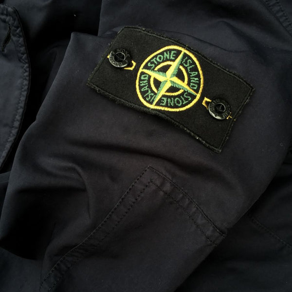 stone island badge on navy blazer 2010