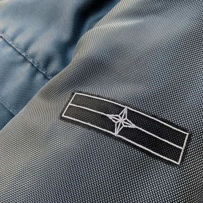 stone island denims compass logo on sleeve