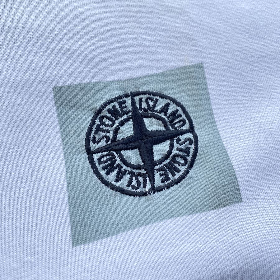 emrboidered and printed stone island logo