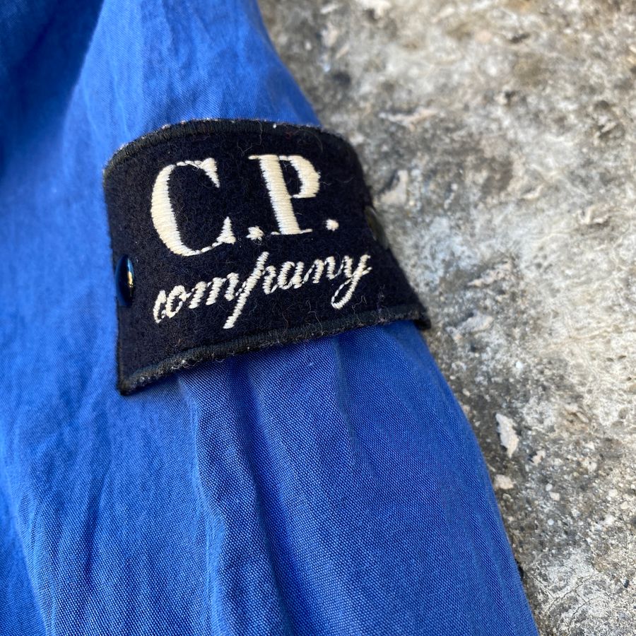 cp company undersixteen badge on flight jacket