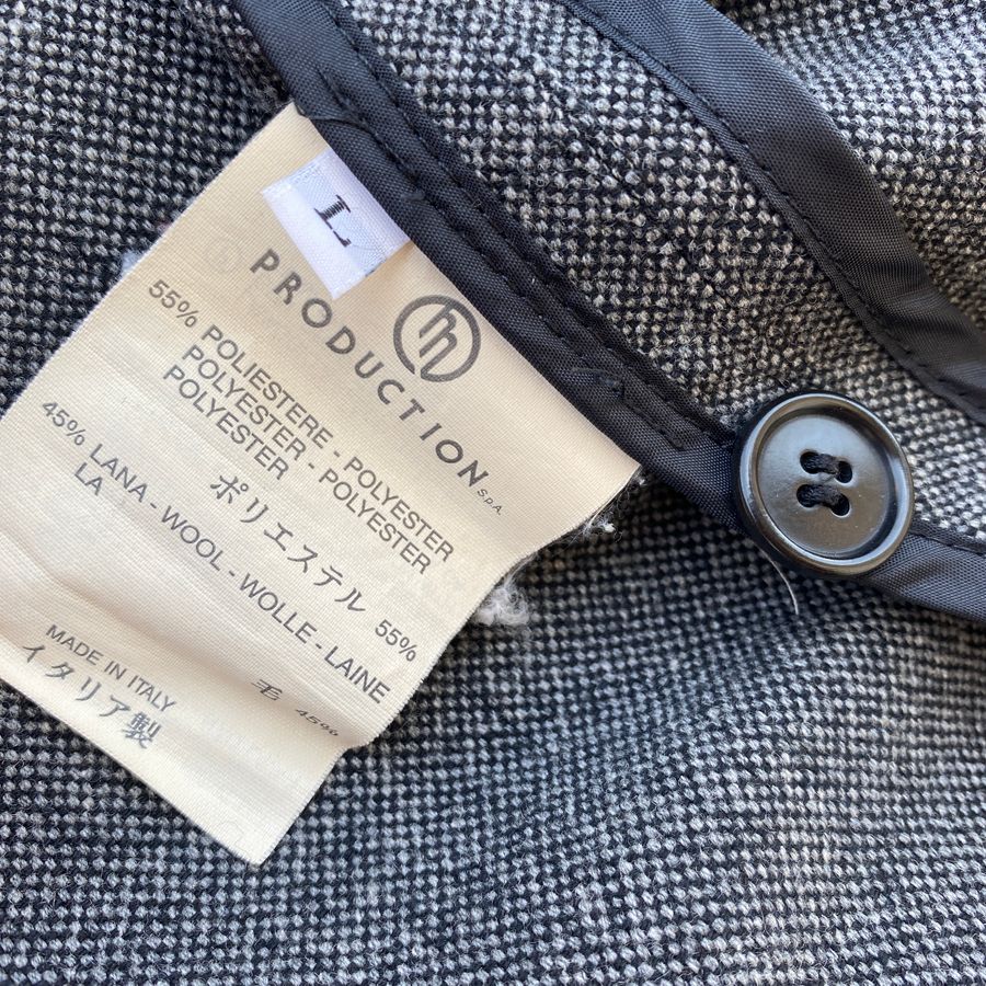 massimo osti production logo on care label